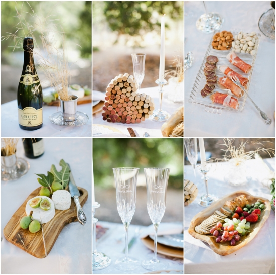 Wedding picnic setting with champagne, cheese, and fruit