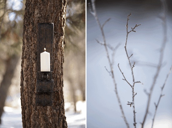 Candle on tree with snowy branch, winter aesthetic, cozy decor