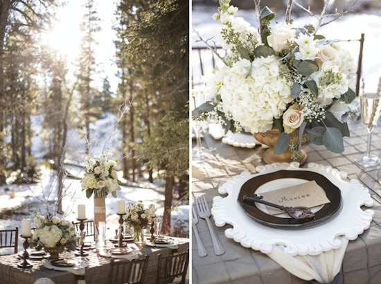 Elegant outdoor wedding table setting with white floral centerpiece and key