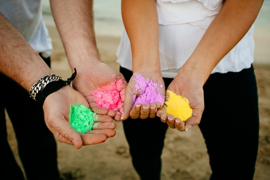 Hands holding colorful powder during the Holi festival