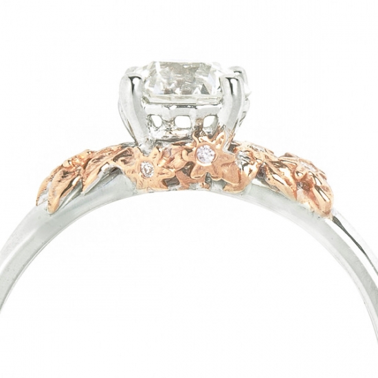 Elegant diamond engagement ring with floral accents