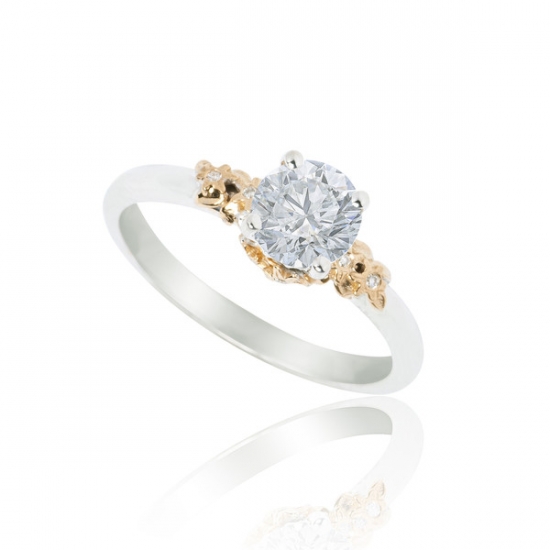 Elegant diamond engagement ring with gold detailing
