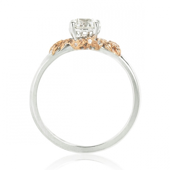Elegant diamond ring with floral detailing on the setting