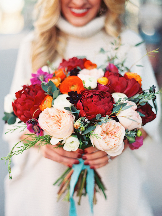 Vibrant red and peach wedding bouquet