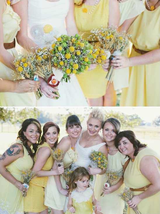 Bridesmaids in yellow dresses hold bouquets at wedding