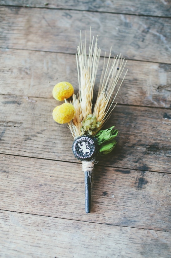 Unique boutonniere made of wheat, hops and a beer bottle cap