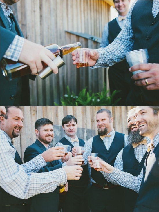 Groomsmen toasting and enjoying drinks, a celebratory moment in the sun