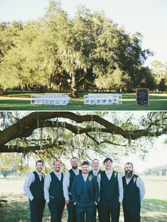 Outdoor wedding venue with chairs and groomsmen ready to celebrate