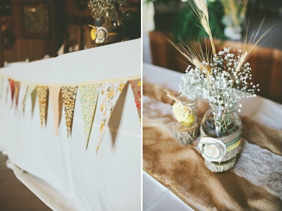 Rustic wedding table decorations with floral bunting and centerpieces