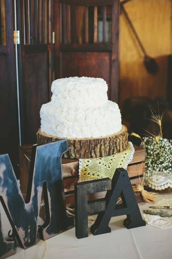 Rustic wedding cake with initials for a beautiful celebration