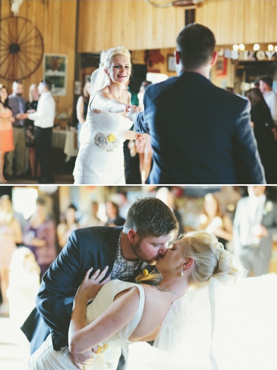 Bride and groom share a tender kiss on the wedding dance floor
