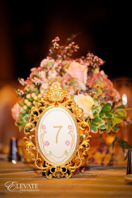 Gold framed table number seven