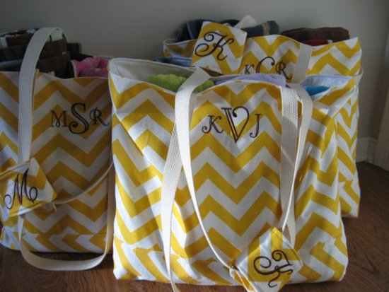 Yellow monogrammed chevron tote bags filled with blankets