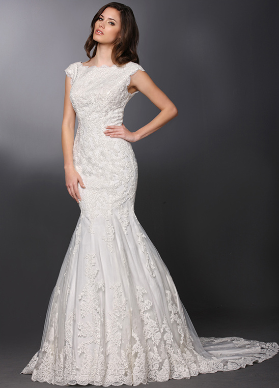 Lace fit and flare wedding dress with cap sleeves