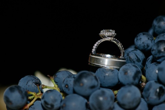 Wedding rings on a bunch of grapes