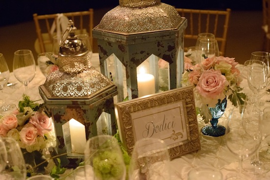 Wedding table decor with lanterns and flowers