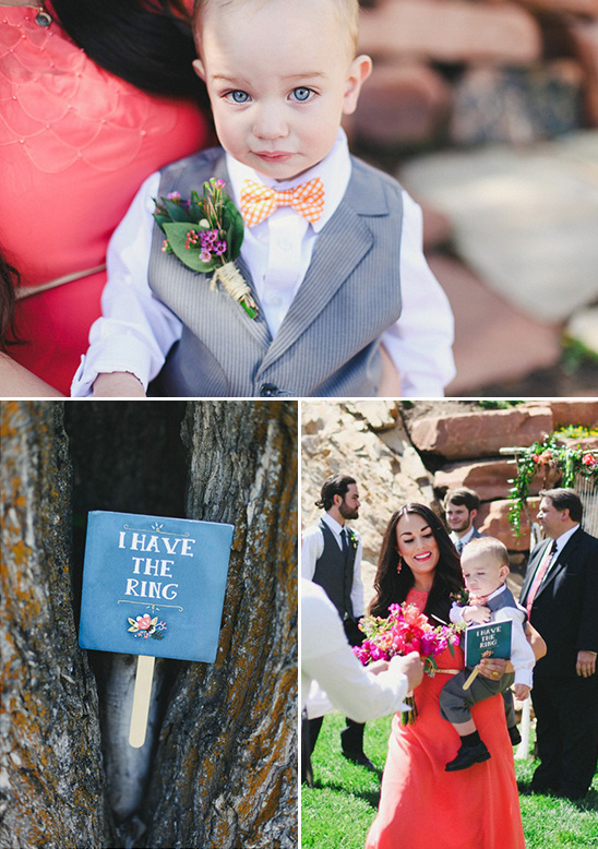 little bow tied ring bearer and a I have the ring sign