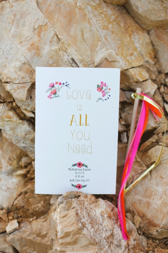 love is all you need wedding program and streamer
