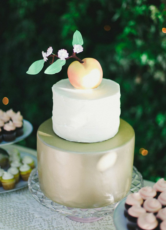 peach topped wedding cake