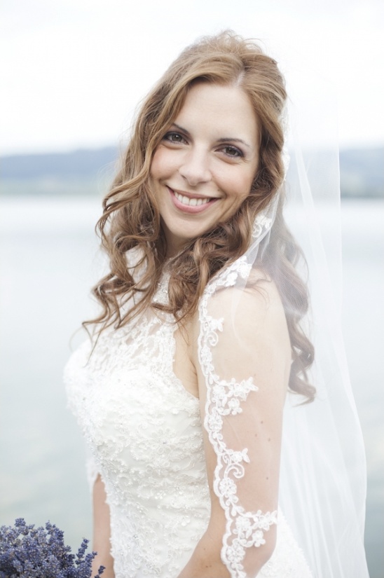 Smiling bride in wedding dress