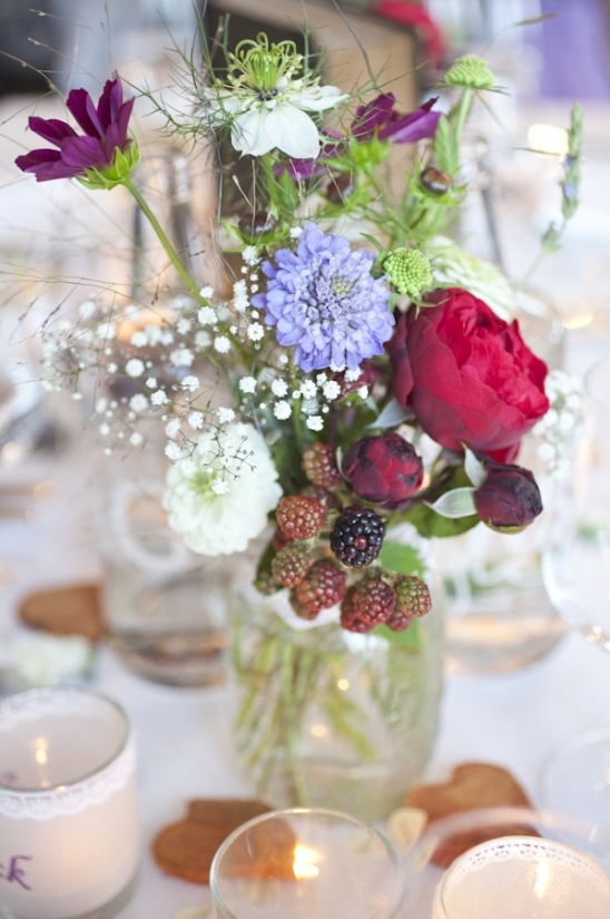 Fresh wildflower bouquet in mason jar centerpiece