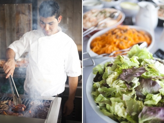 Chef grilling food next to salad bar selection