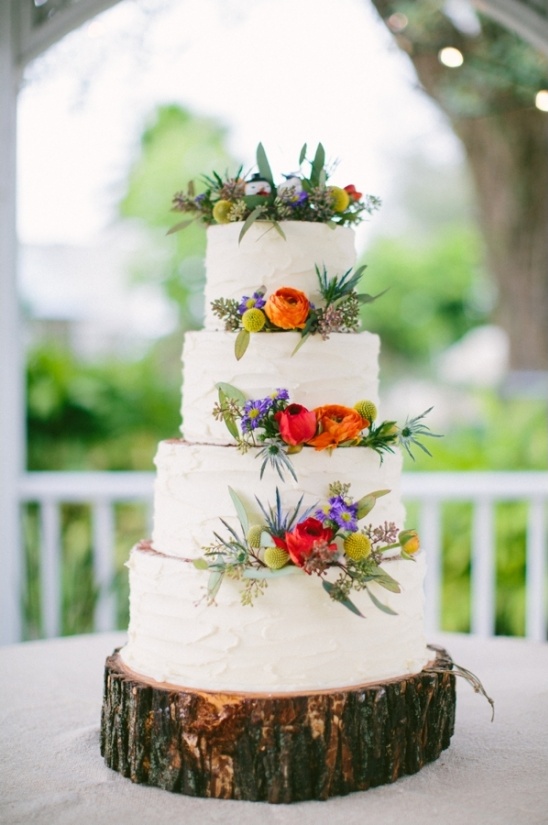 beautiful white wedding cake with floral decor