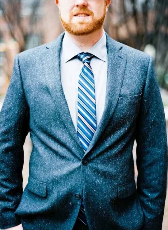 tweed jacket and blue tie groom look