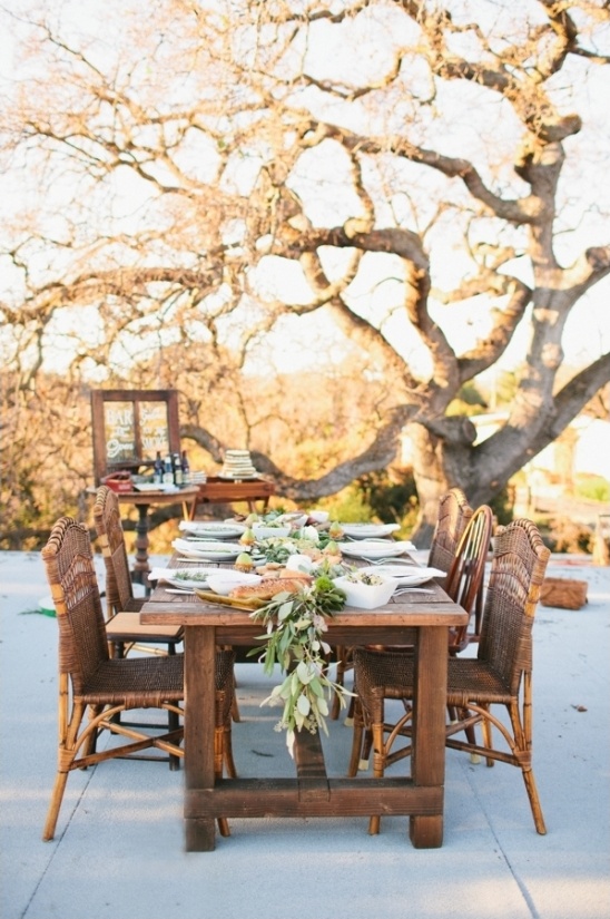 wicker chairs and wooden table reception ideas