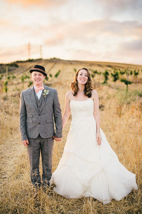 Couple in wedding attire,  field wedding