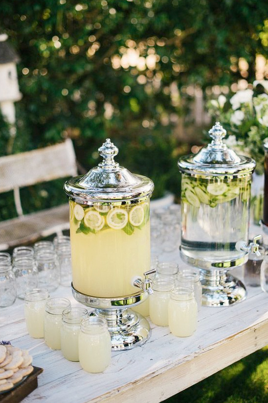 Lemonade and cucumber water at outdoor party table