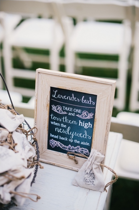 Lavender buds wedding toss station with chalkboard sign
