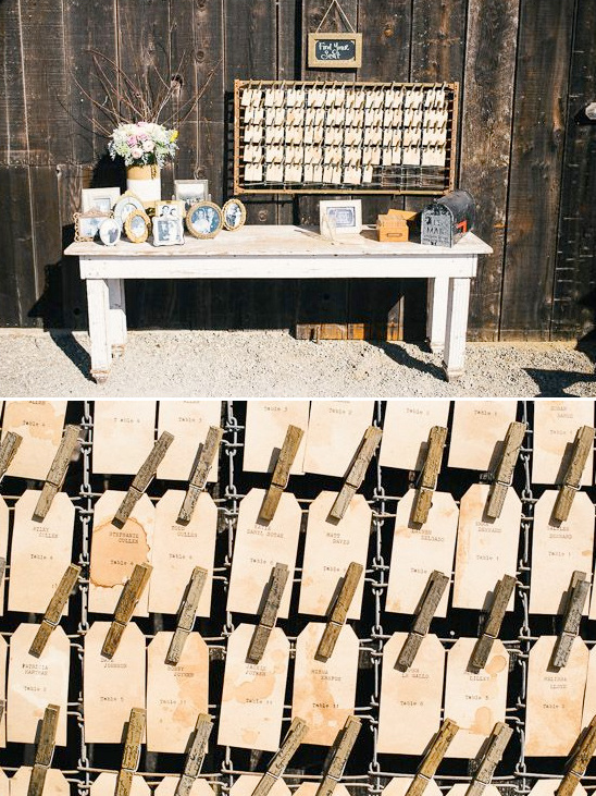 Rustic wedding seating chart with photos and tags