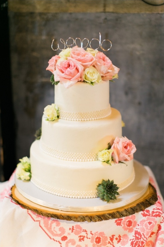 rose topped wedding cake