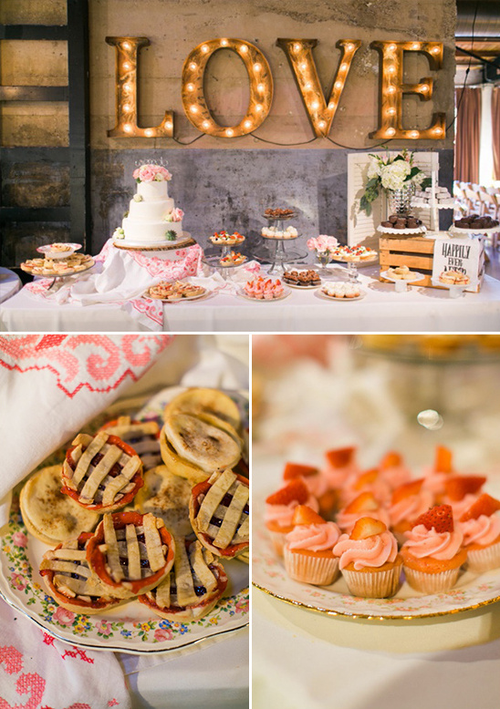 dessert table with marquee love sign