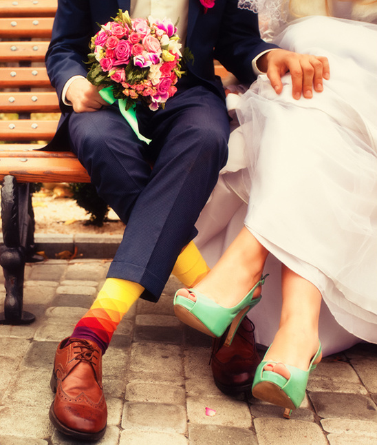 Quirky wedding style colorful socks green heels bouquet