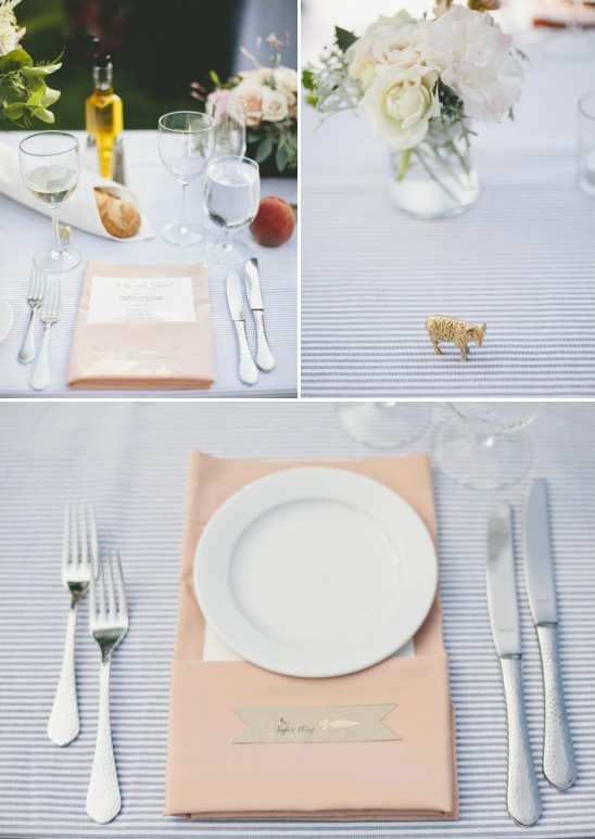 peach table settings on blue pinstripe tablecloth