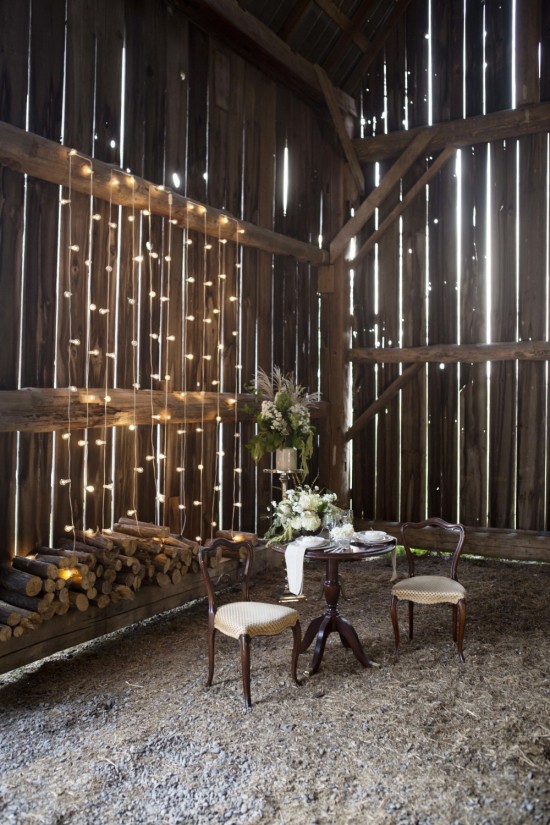 Rustic barn wedding, lights, chairs, table