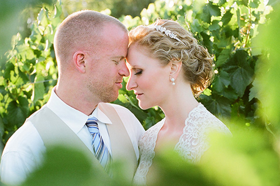 Happy couple sharing a tender moment in vineyard