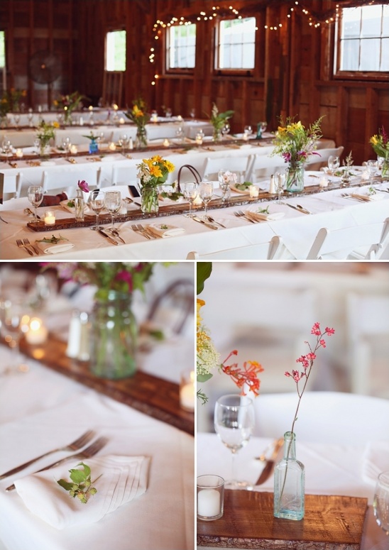 family style table setting with simple floral centerpieces