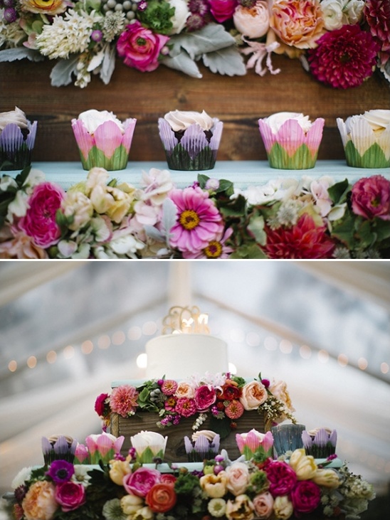 flower inspired cupcakes and towering wedding cake