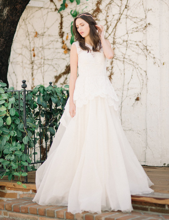 Elegant bride in a flowing lace wedding gown
