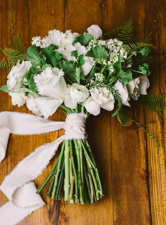 Elegant white wedding bouquet with greenery