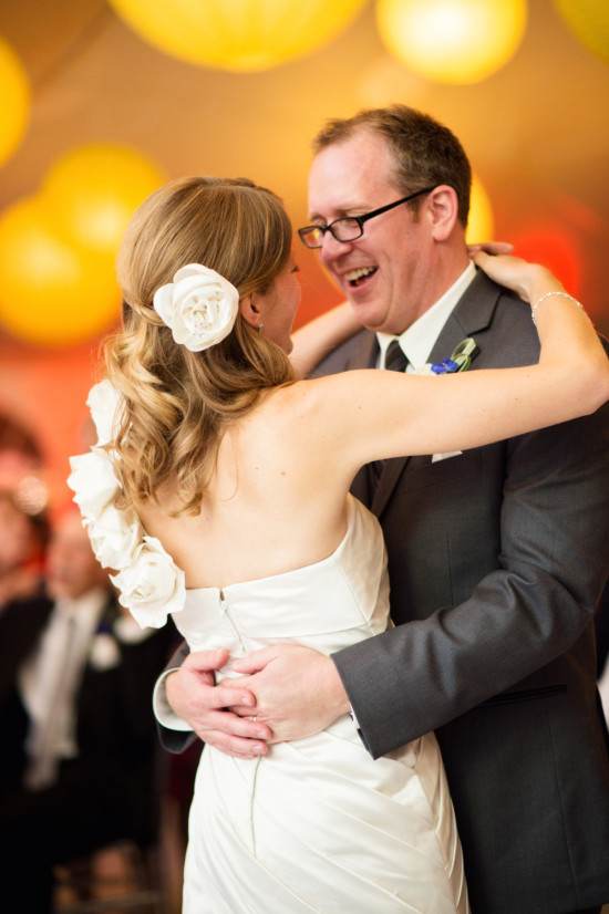 Happy bride and groom share their first dance together
