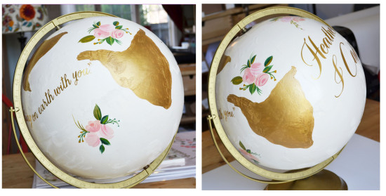 Painted globe with gold continents floral accents and script