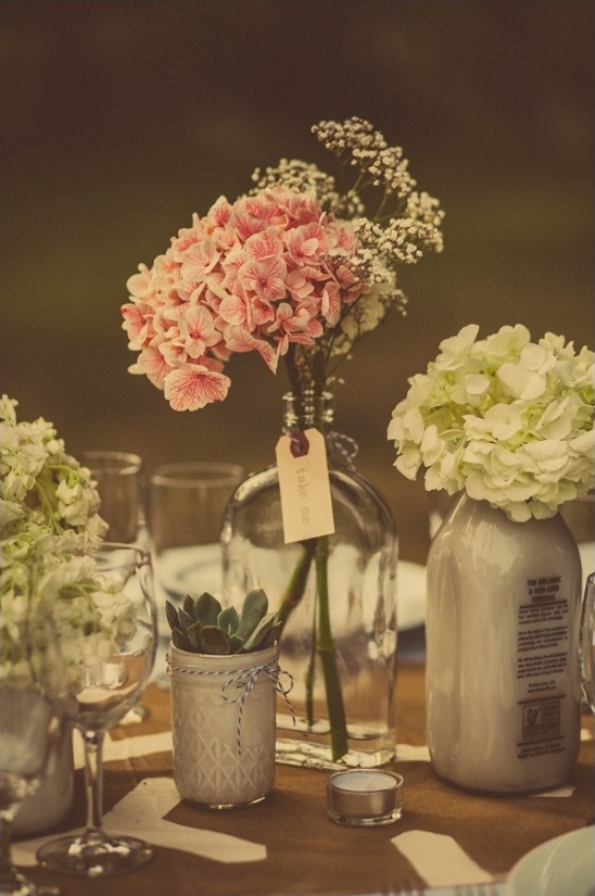 collected glass jars used as centerpieces