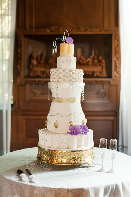 gold and purple regal wedding cake