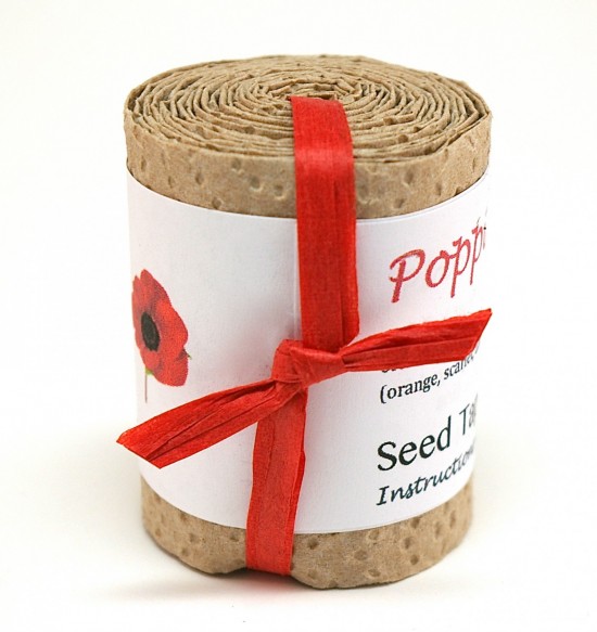 Poppy seed tape roll with red ribbon