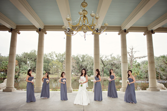 Bride and bridesmaids in gray dresses outdoor wedding