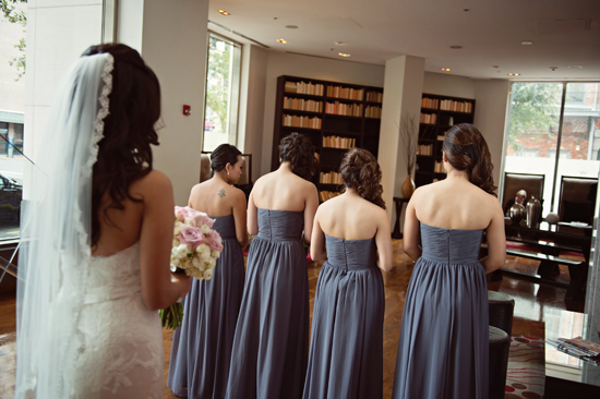 Bride and bridesmaids prepare before the wedding ceremony